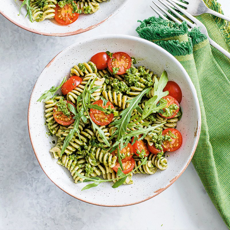 Pasta with kale pesto and tomatoes