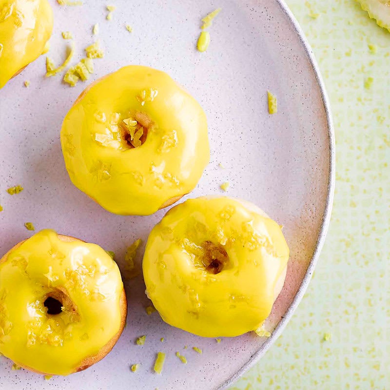 Baked yoghurt, honey and lemon doughnuts with citrus glaze