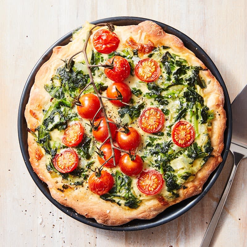 Spinach, caramelised onion and tomato quiche