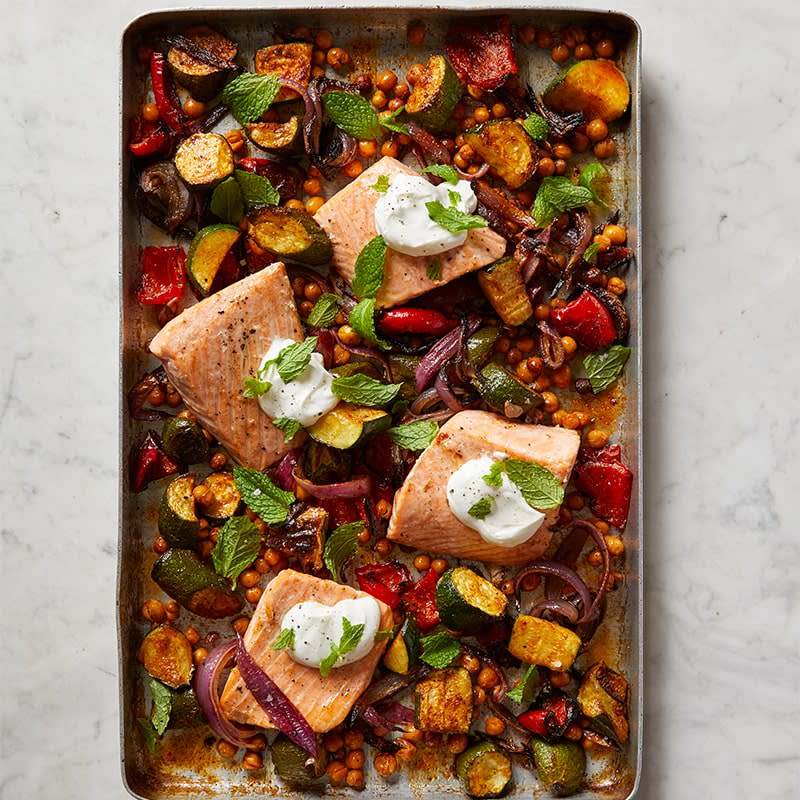 Roasted salmon with chickpeas, zucchini, and capsicum tray bake