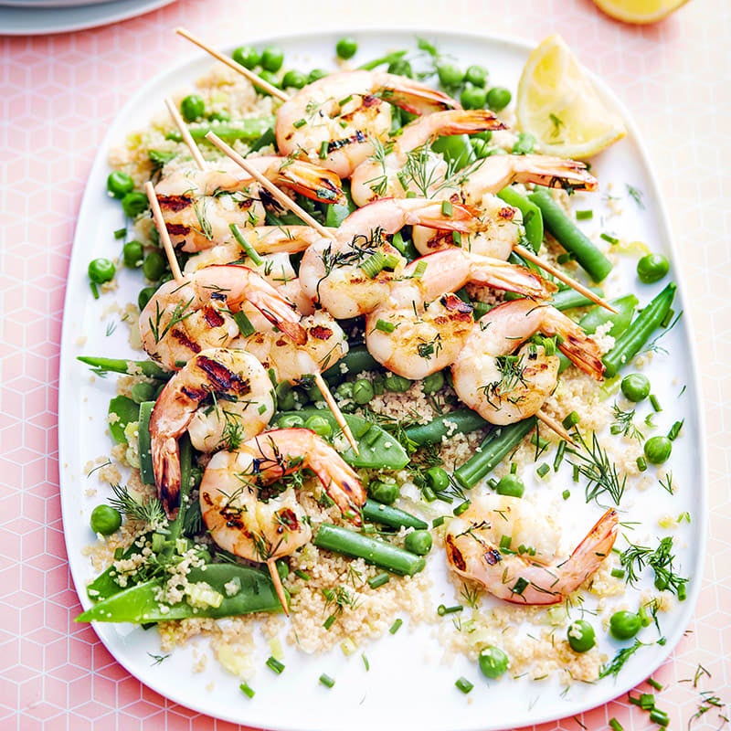 Photo of Couscous and pea salad with grilled prawn skewers by WW
