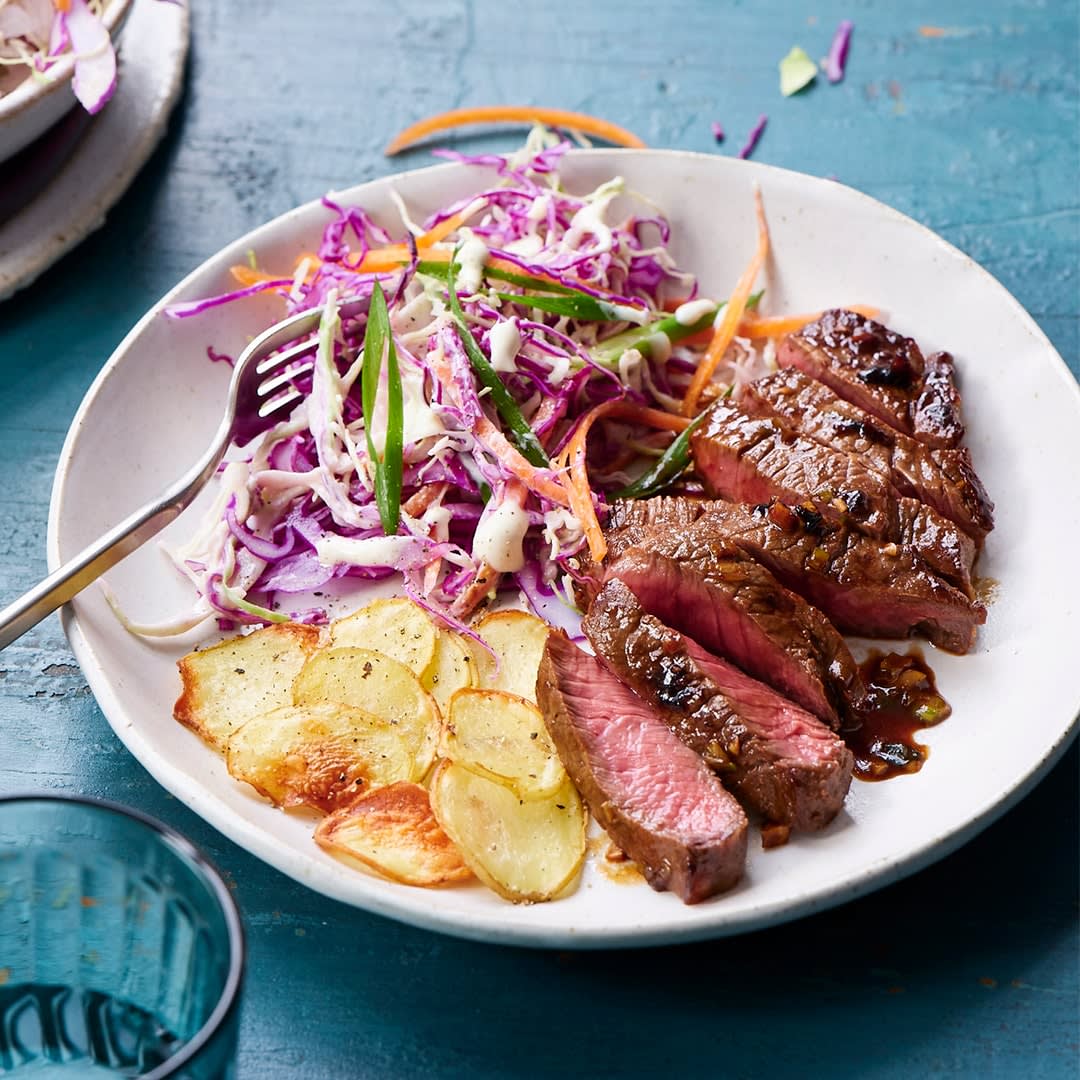 Marinated steak and chips with creamy coleslaw