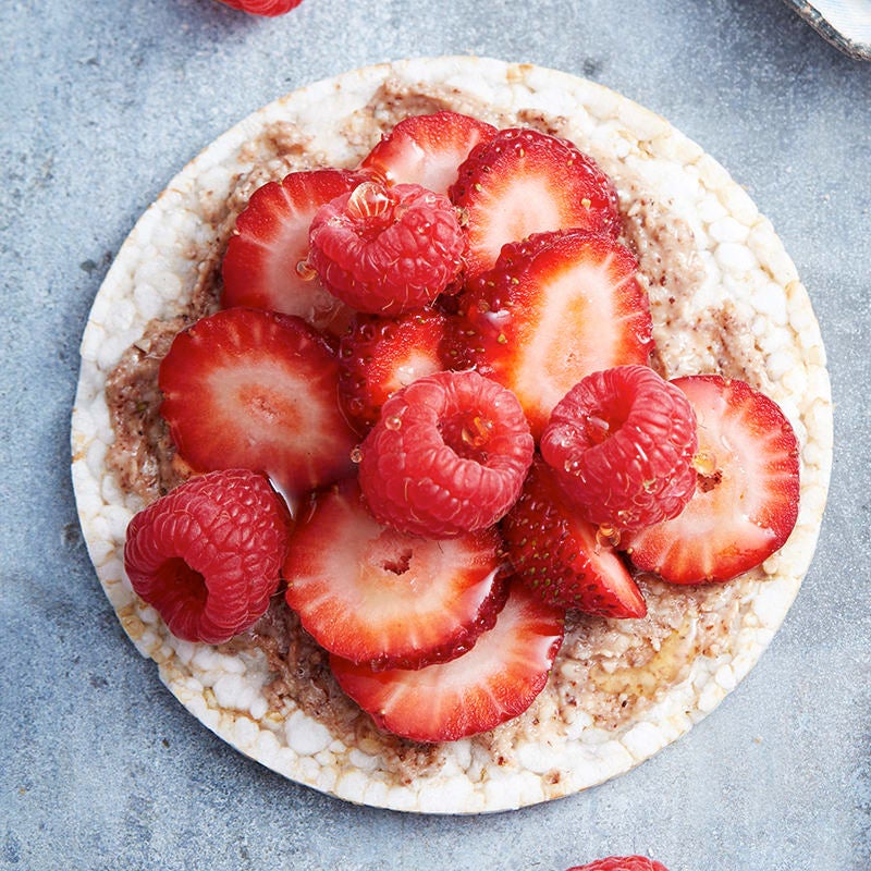 Photo of Nut butter, berry and honey rice cake by WW