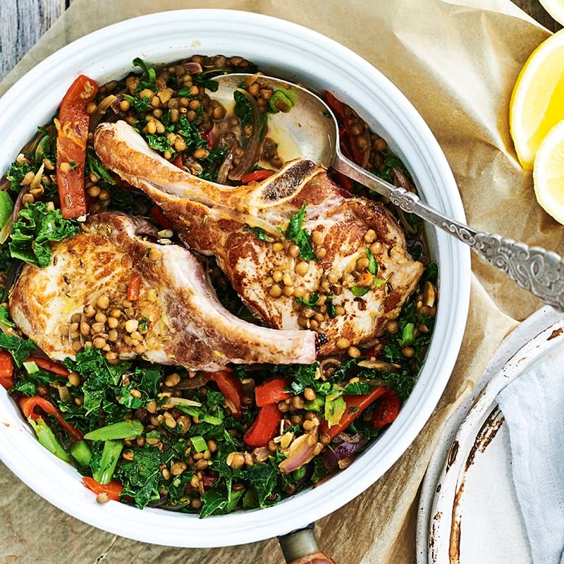 Fennel-crusted pork cutlets with lentils and kale
