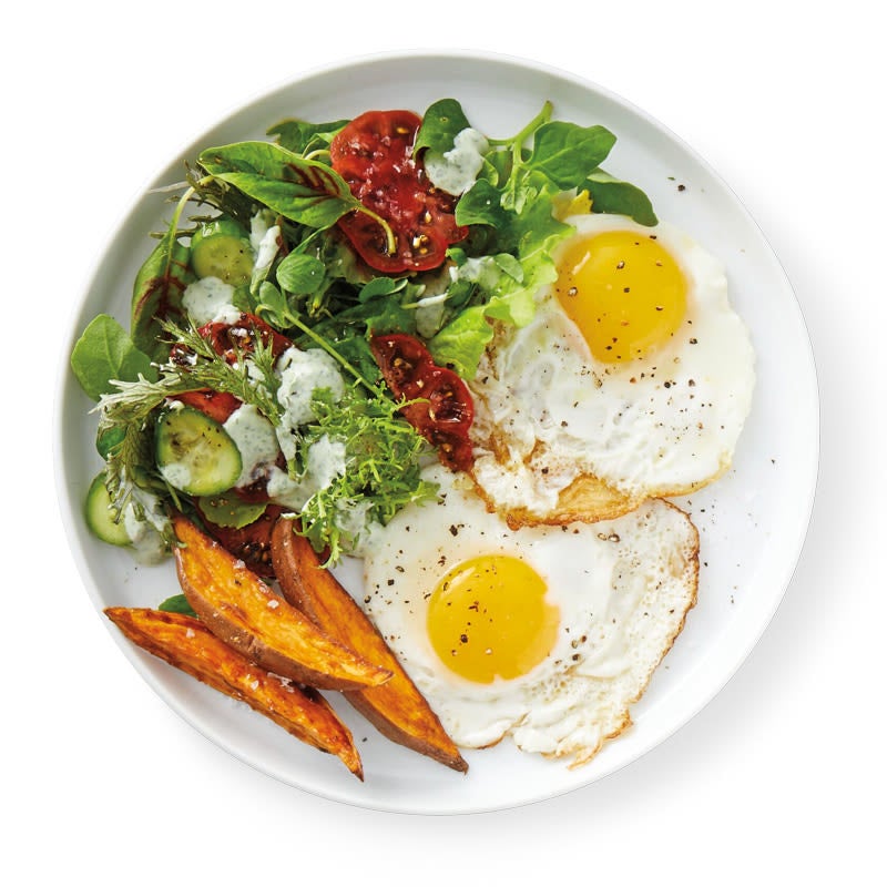 Photo of Eggs with roasted sweet potatoes and greens by WW