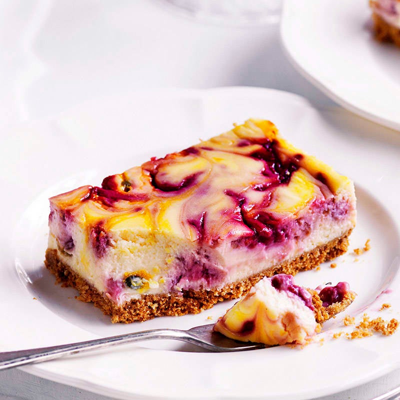 Photo of Raspberry and passionfruit ripple cheesecake slice by WW