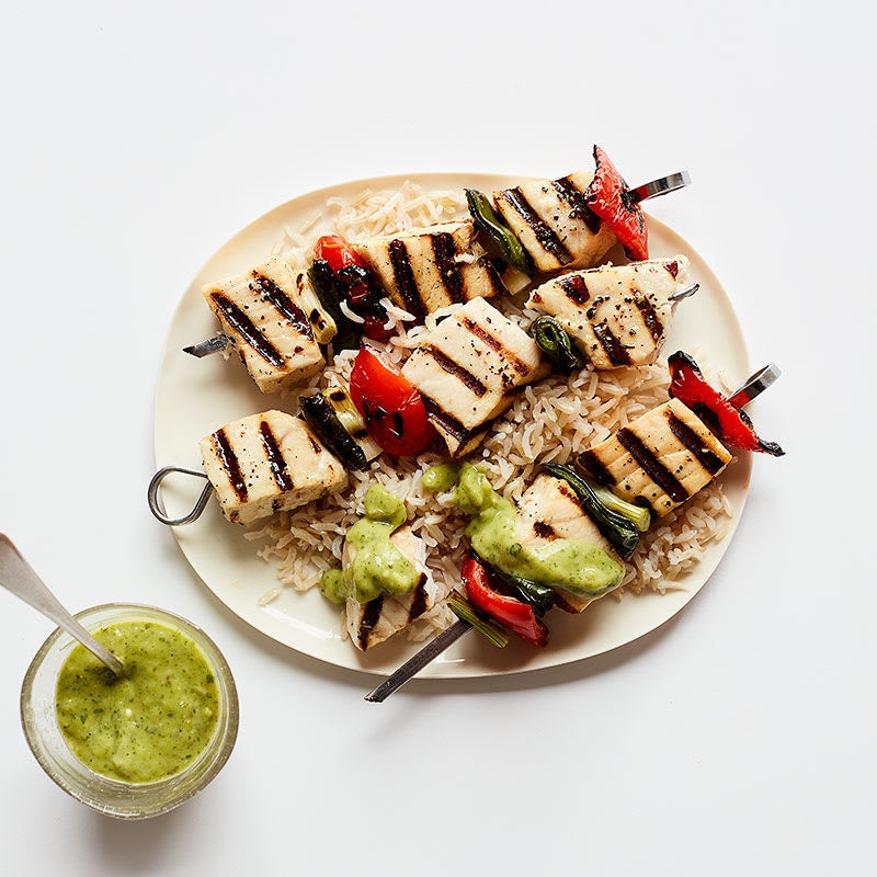 Photo of Fish and vegie skewers with creamy avocado sauce and brown rice by WW