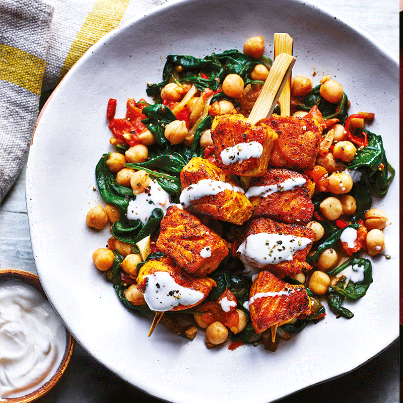 Indian-style salmon skewers with chickpea saag