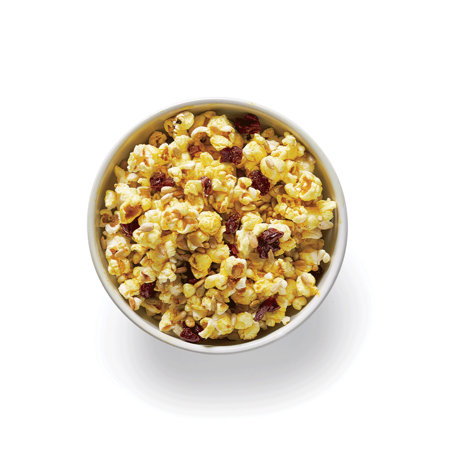 Curried popcorn with dried cranberries