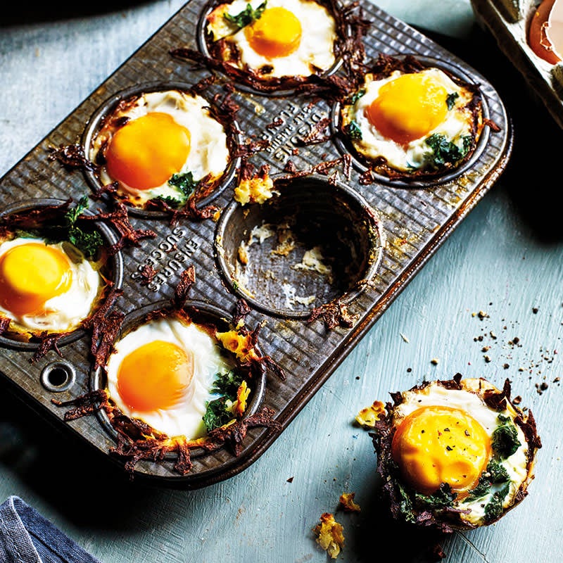 Potato nests with baked eggs and kale