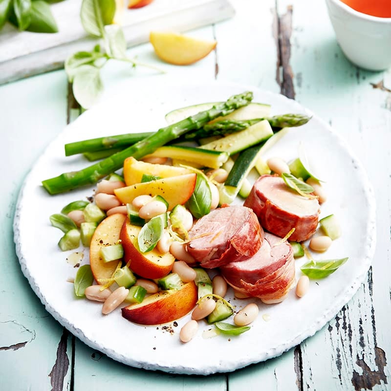 Photo of Prosciutto-wrapped pork with peach, bean and basil salad by WW
